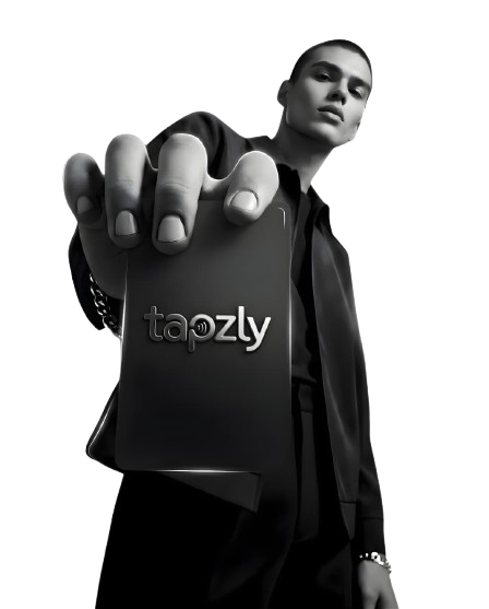 A professional holding a Tapzly NFC card